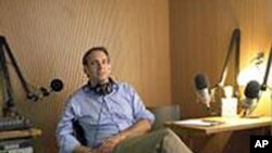 美国广播纪实节目制作人大卫.艾塞