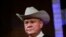 FILE - Former Alabama Chief Justice and U.S. Senate candidate Roy Moore speaks at a rally, in Fairhope, Alabama, Sept. 25, 2017. The 70-year-old candidate defiantly denied allegations of decades-old sexual misconduct with minors published Thursday in a Washington Post story.