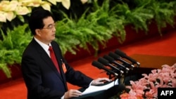 Chủ tịch Trung Quốc Hồ Cẩm Ðào đọc diễn văn khai mạc Đại hội Ðảng Cộng sản lần thứ 18 tại Sảnh đường Nhân dân ở Bắc Kinh, ngày 8/11/2012. 