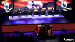 FILE - Uganda's presidential candidates take part in a debate in the capital, Kampala, Jan. 15, 2016, ahead of the Feb. 18 presidential election. Incumbent Yoweri Museveni did not attend. 