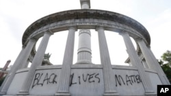 The words “Black Lives Matter” spray painted on a monument to former Confederate President Jefferson Davis in Richmond, Va., June 25, 2015.