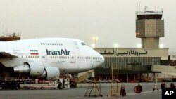 FILE - A Boeing 747 of Iran's national airline is seen at Mehrabad International Airport in Tehran, June 2003. 
