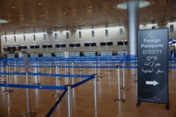 Check-in counters are empty at the Ben Gurion Airport near Tel Aviv, Israel, March 10, 2020.