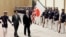 U.S. Vice President Mike Pence, third from left, and Japan's Prime Minister Shinzo Abe review an honor guard before their meeting at Abe's official residence in Tokyo Wednesday, Feb. 7, 2018. 