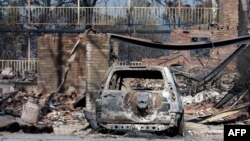 호주 동남부에 발생한 산불로 불에 탄 자동차.