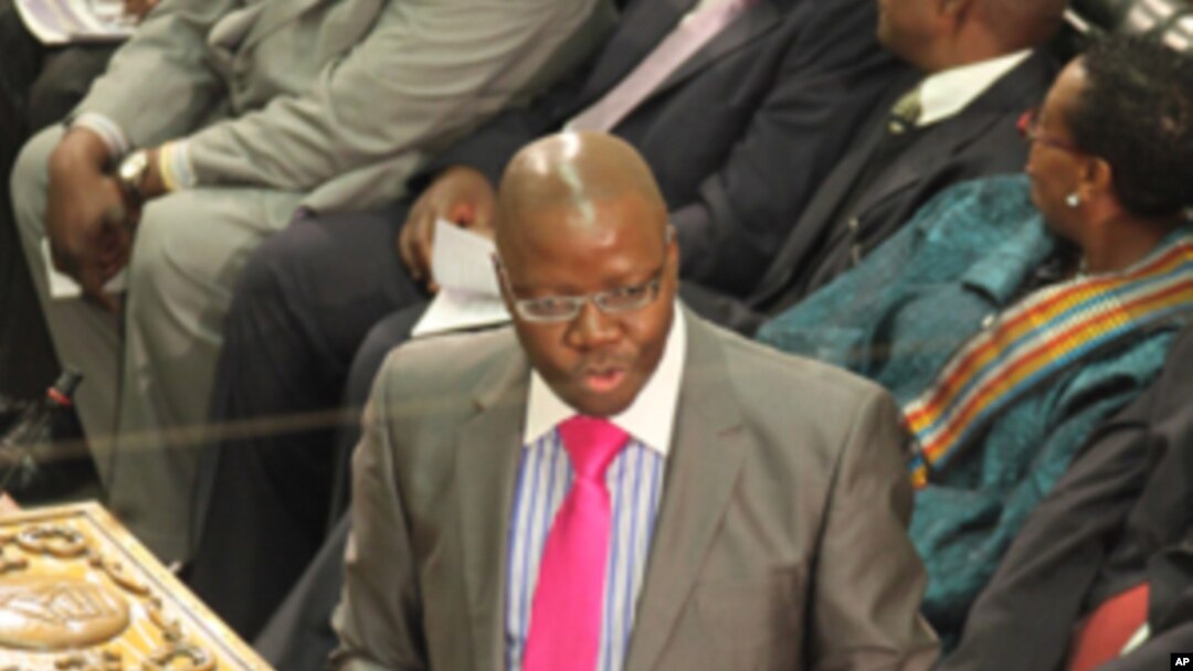 Zimbabwe's Finance Minister Tendai Biti addresses parliament during his presentation of the mid term fiscal policy statement in Harare, July 26, 2011.