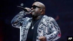 FILE - Recording artist CeeLo Green performs during halftime of an NBA basketball game between the Utah Jazz and Detroit Pistons, Oct. 28, 2015 in Auburn Hills, Michigan.