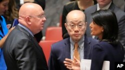 United Nations Ambassadors Vasily Nebenzya of Russia, left, Liu Jieyi of China, center, and Nikki Haley of the U.S., right, confer after the United Nations non-proliferation meeting on North Korea, Sept. 4, 2017 at U.N. headquarters. (AP Photo/Bebeto Matthews)