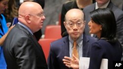 United Nations Ambassadors Vasily Nebenzya of Russia, left, Liu Jieyi of China, center, and Nikki Haley of the U.S., right, confer after the United Nations non-proliferation meeting on North Korea, Sept. 4, 2017 at U.N. headquarters. 