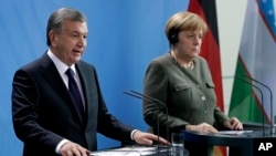 O'zbekiston Prezidenti Shavkat Mirziyoyev Germaniya kansleri Angela Merkel bilan Berlinda ko'rishmoqda, 21-yanvar, 2019-yil