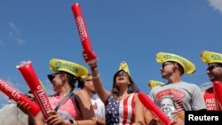 People cheer ahead of the Nathan&#39;s Famous Fourth of July Hot Dog-Eating Contest held on Independence Day at Maimonides Park in Brooklyn, New York City.