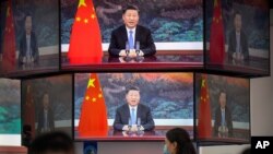시진핑 중국 국가주석이 지난 4일 상하이에서 열린 '중국국제수입엑스포(CIIE)' 개막식에서 연설하는 장면이 대형 화면에 중계되고 있다.