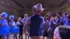 Callum Ganz, 17, center, gives a pre-show pep talk to castmates in 'Crazy for You' on opening night as the Theatre Palisades Youth group returns to the stage after losing their theater in the Palisades fire, in Los Angeles, Feb. 28, 2025.