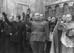FILE - Former Spanish dictator Francisco Franco, center, is seen at a ceremony in Burgos, Spain, in a photo taken in the late 1930s.