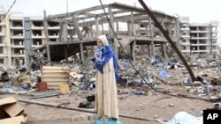 A statue of the Virgin Mary is all that remains of the St. Louis Catholic church, after a series of deadly explosions at a munitions depot devastated adjacent residential neighborhoods, killing about 246 people, in Brazzaville, Republic of Congo, March 7,