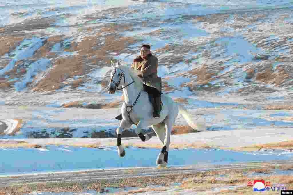 North Korean leader Kim Jong Un rides a horse during snowfall in Mount Paektu in this image released by North Korea&#39;s Korean Central News Agency (KCNA).