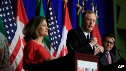 U.S. Trade Representative Robert Lighthizer, center, with Canadian Minister of Foreign Affairs Chrystia Freeland, left, and Mexico's Secretary of Economy Ildefonso Guajardo Villarrea, right during the fourth round of NAFTA talks.