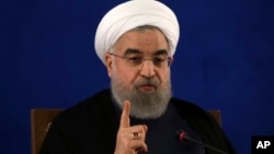 Le président iranien Hassan Rouhani donne une conférence de presse à Téhéran, Iran, 22 mai 2017. 