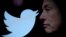 FILE PHOTO: Illustration shows Elon Musk photo and Twitter logo