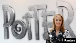 British author JK Rowling poses during the launch of new online website Pottermore in London.