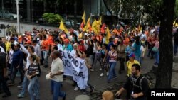 Opposition supporters take part in a protest against upcoming presidential elections, in Caracas, Venezuela, May 16, 2018. 