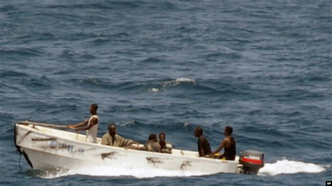 In this U.S. Navy photo, pirates leave the Ukrainian merchant vessel MV Faina for Somalia's shore Wednesday, Oct. 8, 2008 while under observation by a U.S. Navy ship. The MV Faina, which was carrying a cargo of Ukrainian T-72 tanks and related military eq