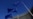 FILE PHOTO: European Union flags flutter outside the European Commission headquarters in Brussels