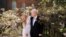 Downing Street handout photo of Prime Minister Boris Johnson and Carrie Johnson in the garden of 10 Downing Street after their wedding on Saturday. (Rebecca Fulton/Downing Street via AP)