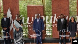 FILE— Rwandan President Paul Kagame, left and his wife, first lady Jeannette Kagame, President of the Central African Republic Faustin-Archange Touadérale, center and Ethiopia's Prime Minister Abiy Ahmed and his wife at the Kigali Genocide Memorial, April 7, 2024.