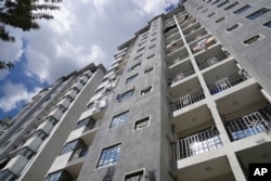 FILE - A view of an apartment block where Juanta Mbulwa Nzomo 19-year-old girl who died after allegedly being pushed by her boyfriend from the 10th floor of an apartment in Thome estate, Kasarani in downtown Nairobi, Kenya, March 6, 2024