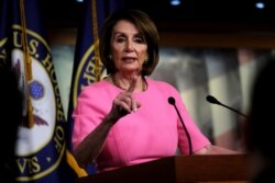 FILE - U.S. House Speaker Nancy Pelosi (D-CA) holds her weekly news conference with Capitol Hill reporters in Washington, May 23, 2019.