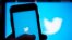FILE: The Twitter application is seen on a digital device, April 25, 2022, in San Diego, California.