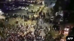 FILE - This frame grab taken from video footage on the Telegram channel @askrasul on October 29, 2023 shows protestors at an airport in Makhachkala. A mob looking for Israelis and Jews overran an airport in Russia's Caucasus republic of Dagestan on October 29..