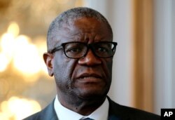 FILE —FILE - DRC Congo Dr. Denis Mukwege is received at the town hall of Bayonne, southwestern France, May 4, 2022.