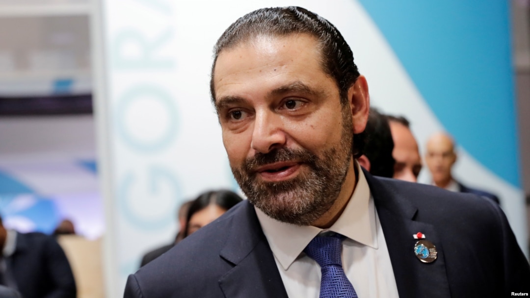 FILE - Lebanon's Prime Minister Saad Hariri gestures during the Paris Peace Forum after the commemoration ceremony for Armistice Day, Nov. 11, 2018. 