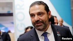 FILE - Lebanon's Prime Minister Saad Hariri gestures during the Paris Peace Forum after the commemoration ceremony for Armistice Day, Nov. 11, 2018. 