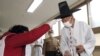 With Masks, Sanitizer & Gloves, South Koreans Go to the Polls
