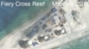 Gambar satelit yang dirilis oleh Inisiatif Transparansi Maritim Asia CSIS tanggal 9 Maret 2017 ini menampilkan konstruksi bangunan di Karang Fiery Cross, kepulauan Spratly, Laut Cina Selatan. (CSIS/AMTI DigitalGlobe/Handout via REUTERS). 