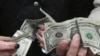 تغییر مبادلات داخلی ایران از ریال به دلار