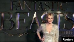 FILE - Writer J.K. Rowling poses as she arrives for the European premiere of the film "Fantastic Beasts and Where to Find Them" in Leicester Square in London, Nov. 15, 2016.