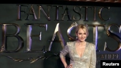 FILE - Writer J.K. Rowling poses as she arrives for the European premiere of the film "Fantastic Beasts and Where to Find Them" in Leicester Square in London, Nov. 15, 2016.