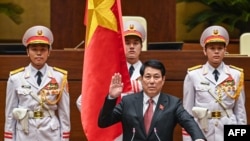 Vietnam's Luong Cuong takes his oath as Vietnam's President during the autumn opening session at the National Assembly in Hanoi on October 21, 2024. Vietnam's parliament named army general Luong Cuong as the country's new president.