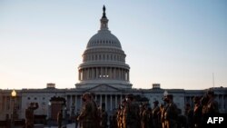 Members of the US National Guard arrive at the US Capitol on January 12, 2021, in Washington, DC. 