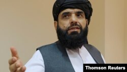 Taliban spokesman Suhail Shaheen leaves after a news conference in Moscow,