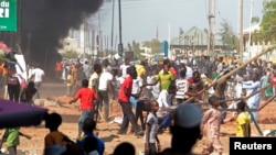 Des manifestants protestent contre le regain de violence au Nigéria, le 1er février 2015. 