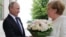 Володимир Путін і Анґела Меркель у Сочі