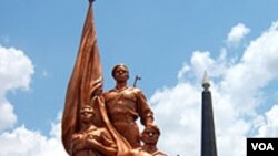 Vitaliy Shabunin, head of the non-governmental Anti-Corruption Action Center, reacts after he was splashed with a green substance during a rally in front of the Specialized Anti-Corruption Prosecutor's Office in Kyiv, Ukraine.