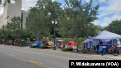 Trump supporters have set up camp since Monday morning, a block away from his reelection rally venue. 