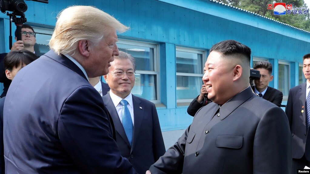 U.S. President Donald Trump shakes hands with North Korean leader Kim Jong Un as they meet at the demilitarized zone (DMZ) separating the two Koreas, in Panmunjom, South Korea, June 30, 2019. KCNA via REUTERS 