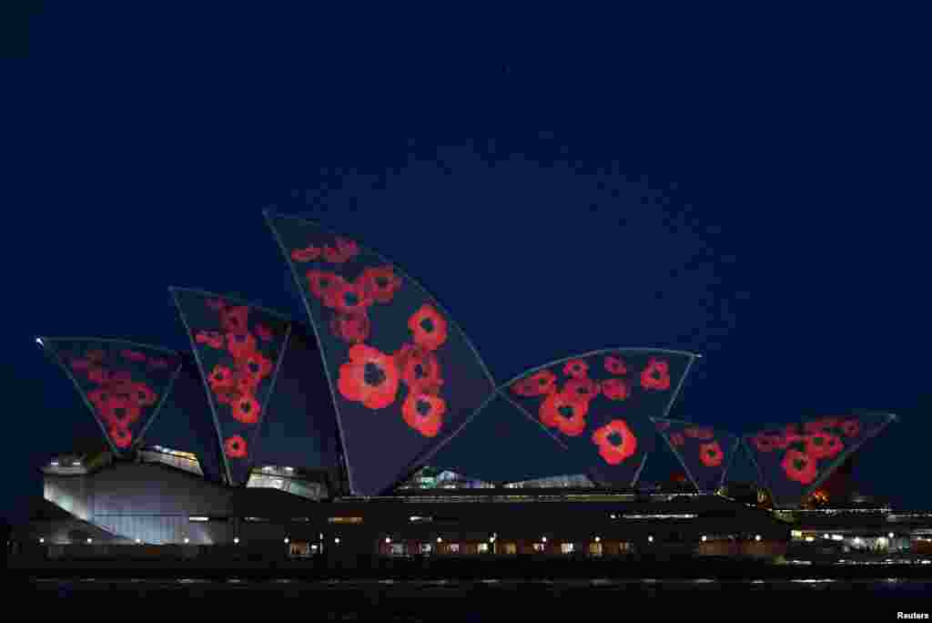 Poppies are seen projected onto the Sydney Opera House in observance of Remembrance Day, commemorating the signing of the peace agreement that ended the first World War and honoring those who served, in Sydney, Australia.